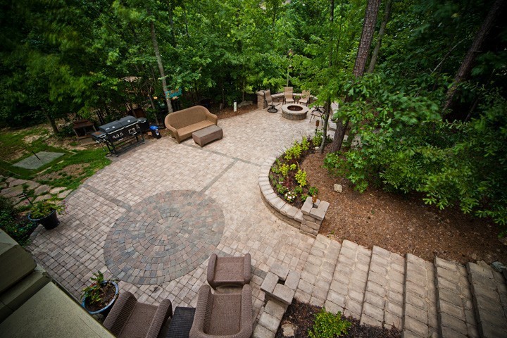Patio with Stone Steps by Sugar Hill Outdoors