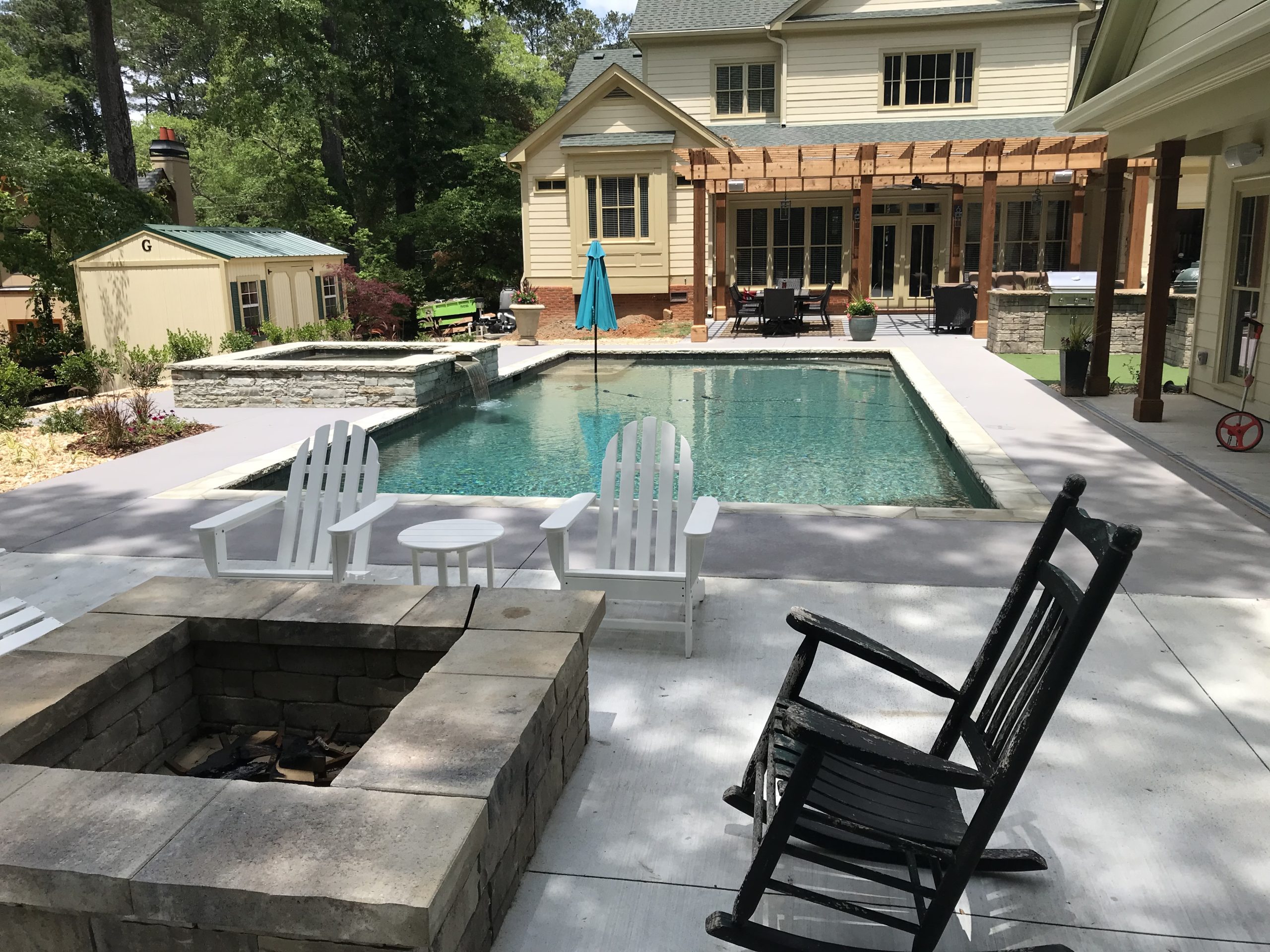 Pool with Firepit by Sugar Hill Outdoors