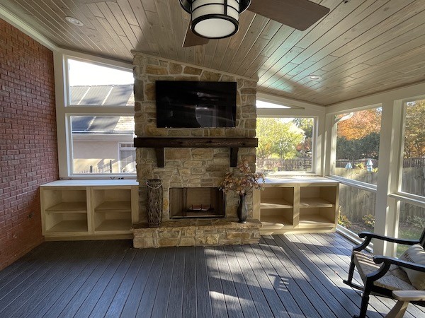 Outdoor Fireplace in Enclosed Deck by Sugar Hill Outdoors