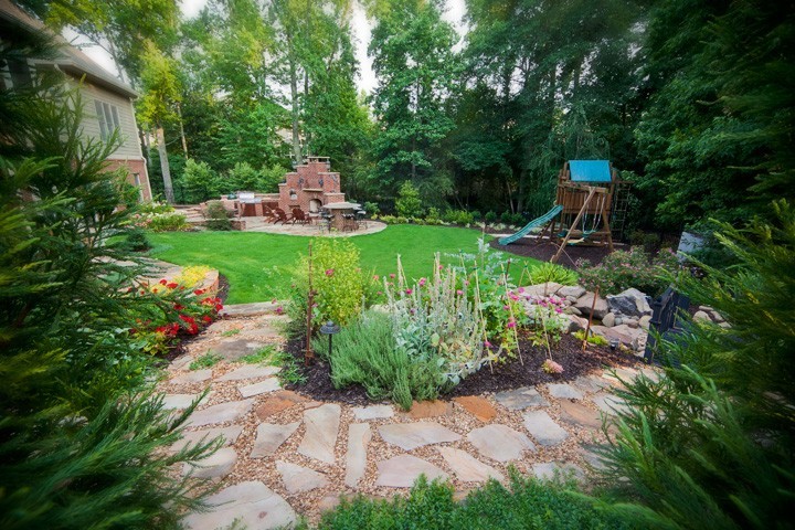 Montville Living Space Landscaping with a Stone Walkway to Play Area by Sugar Hill Outdoors