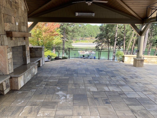 Patio Area under a Pavilion with an Outdoor Fireplace by Sugar Hill Outdoors