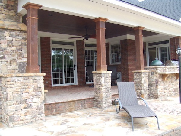 Patio with Stacked Stone by Sugar Hill Outdoors