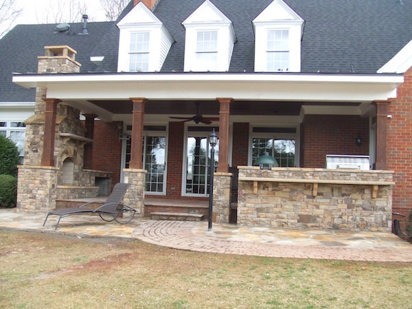 Patio with Stacked Stone by Sugar Hill Outdoors