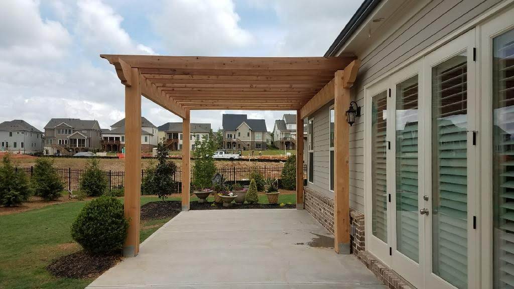 Pergola with Patio Before Photo by Sugar Hill Outdoors