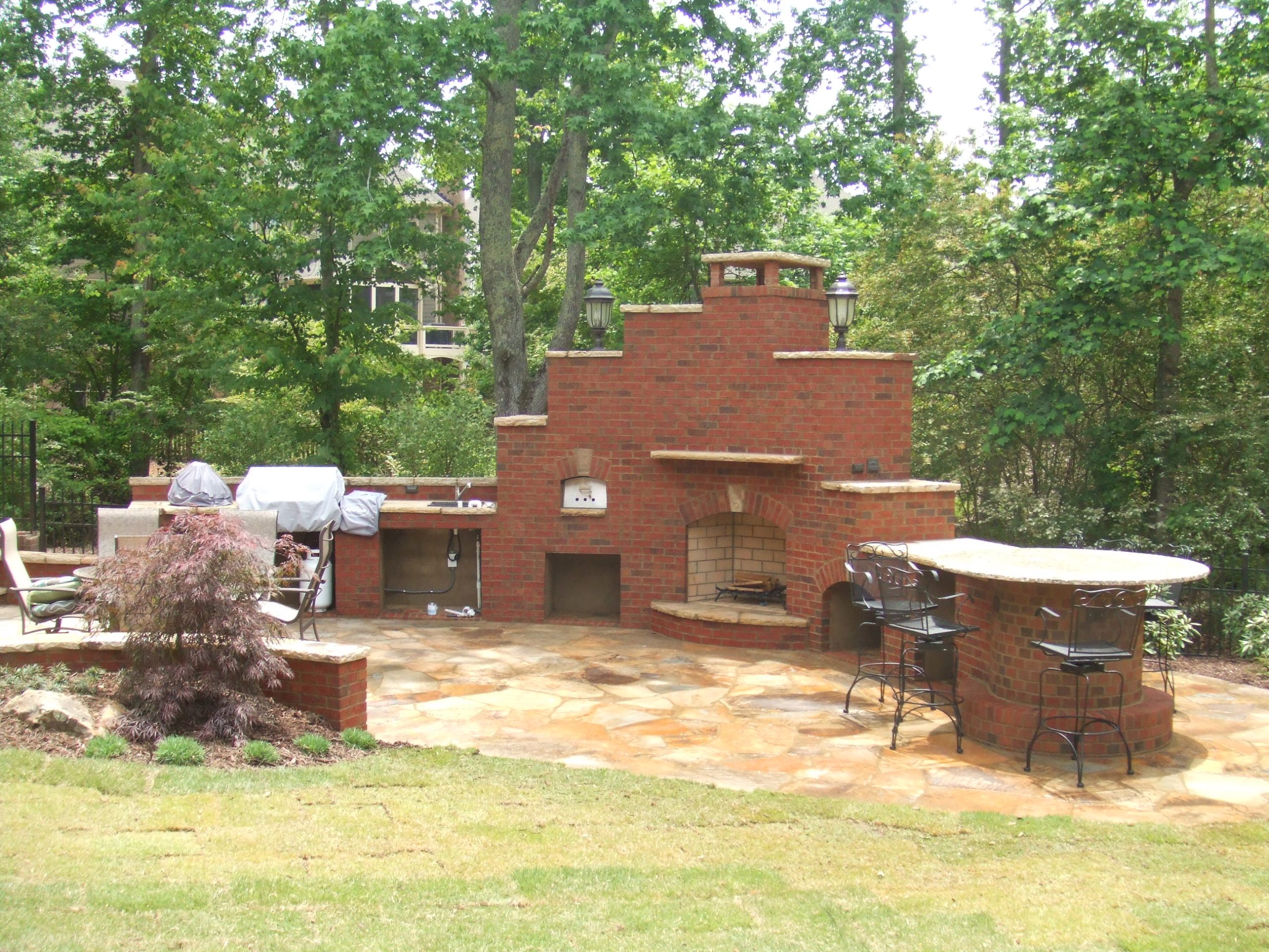 Outdoor Fireplace with Pizza Oven by Sugar Hill Outdoors